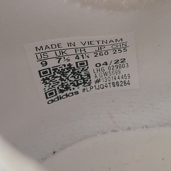 Women's size 9 Adidas NMD_R1. These are white with lime accents. New Without Tag - Picture 7 of 7